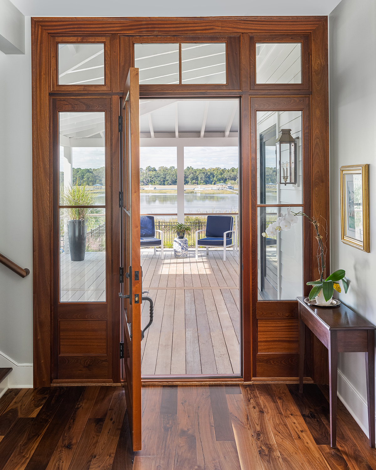 Door leading out to covered patio, overlooking the marsh