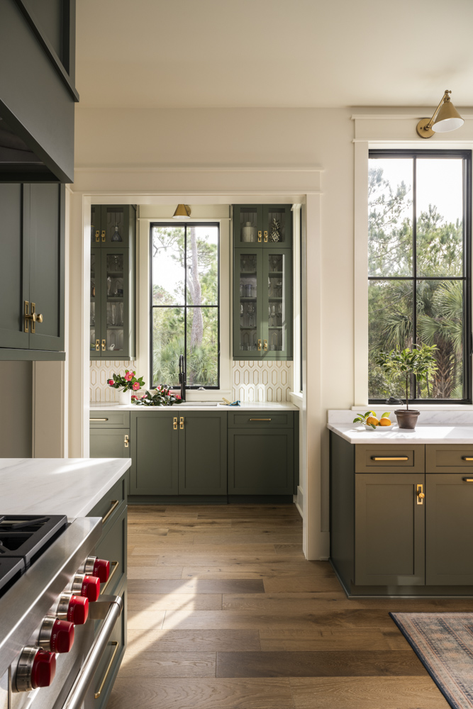 Kitchen Green cabinets in an otherwise bright, light-filled kitchen