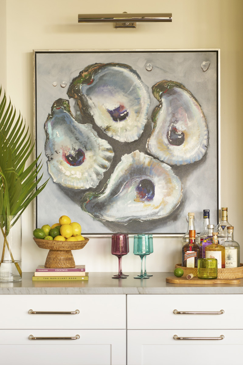 Sage-Vertical-oyster-painting2 Brown leather sofa in full-height window nook with dark moody lighting