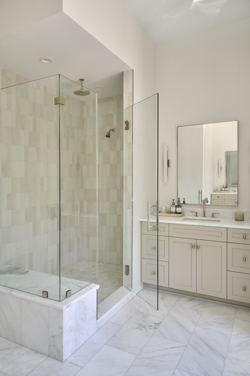 Sage-Vertical-shower Upstairs hallway with slanted ceiling and wood beams